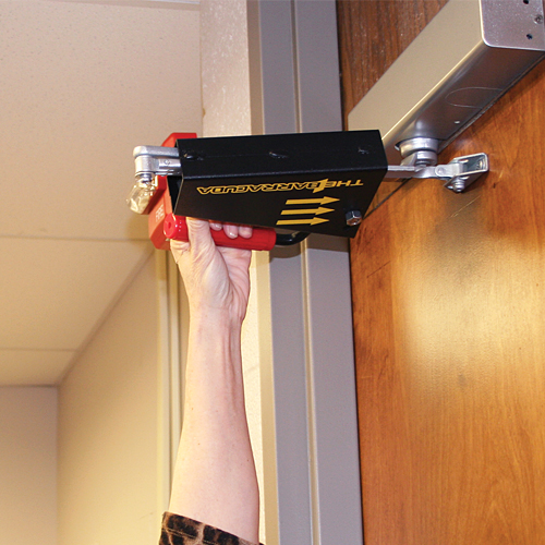 A door close barrier in use on a school door