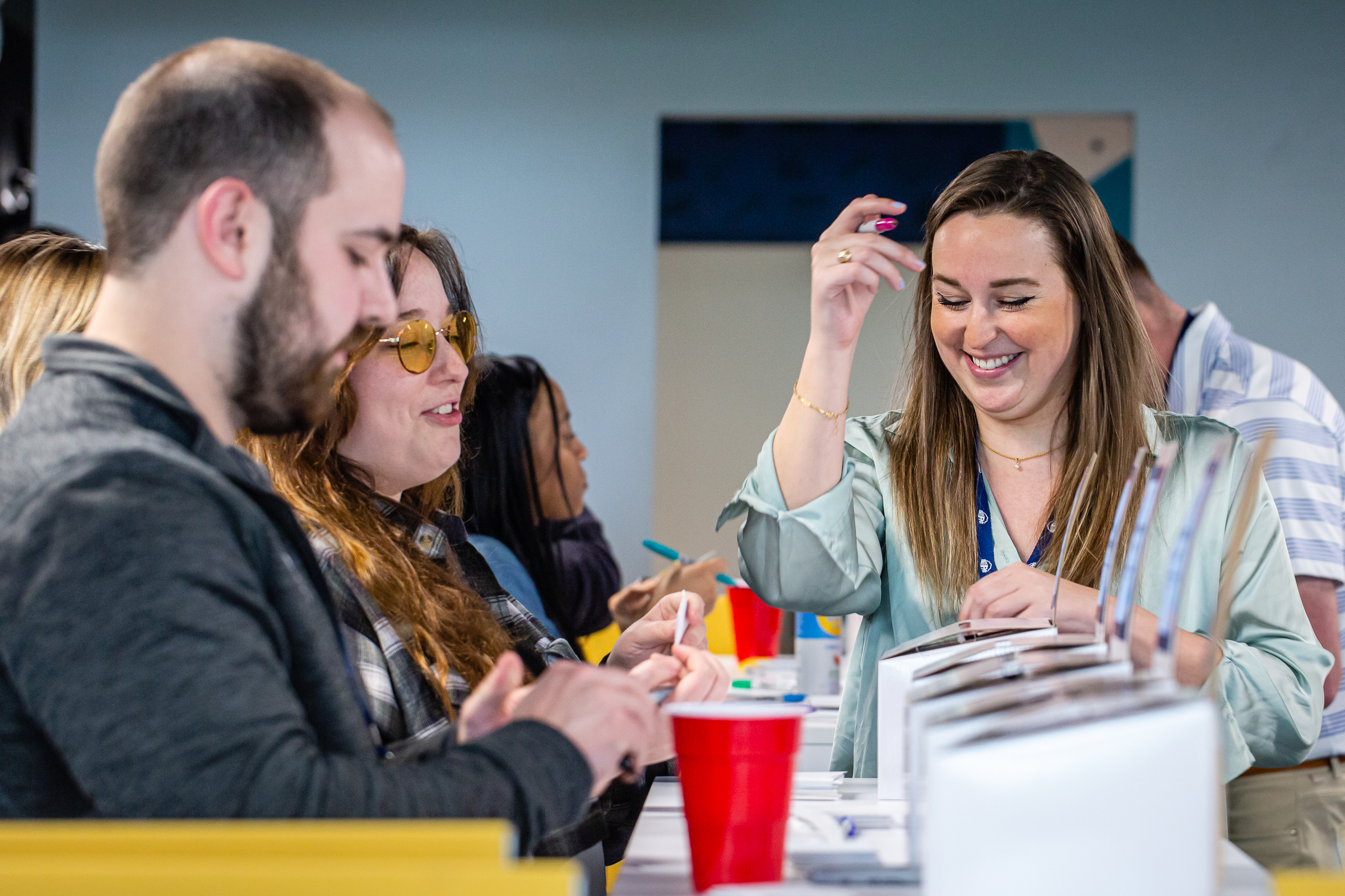 FMX teammates voting for a superlatives contest at an all-company event