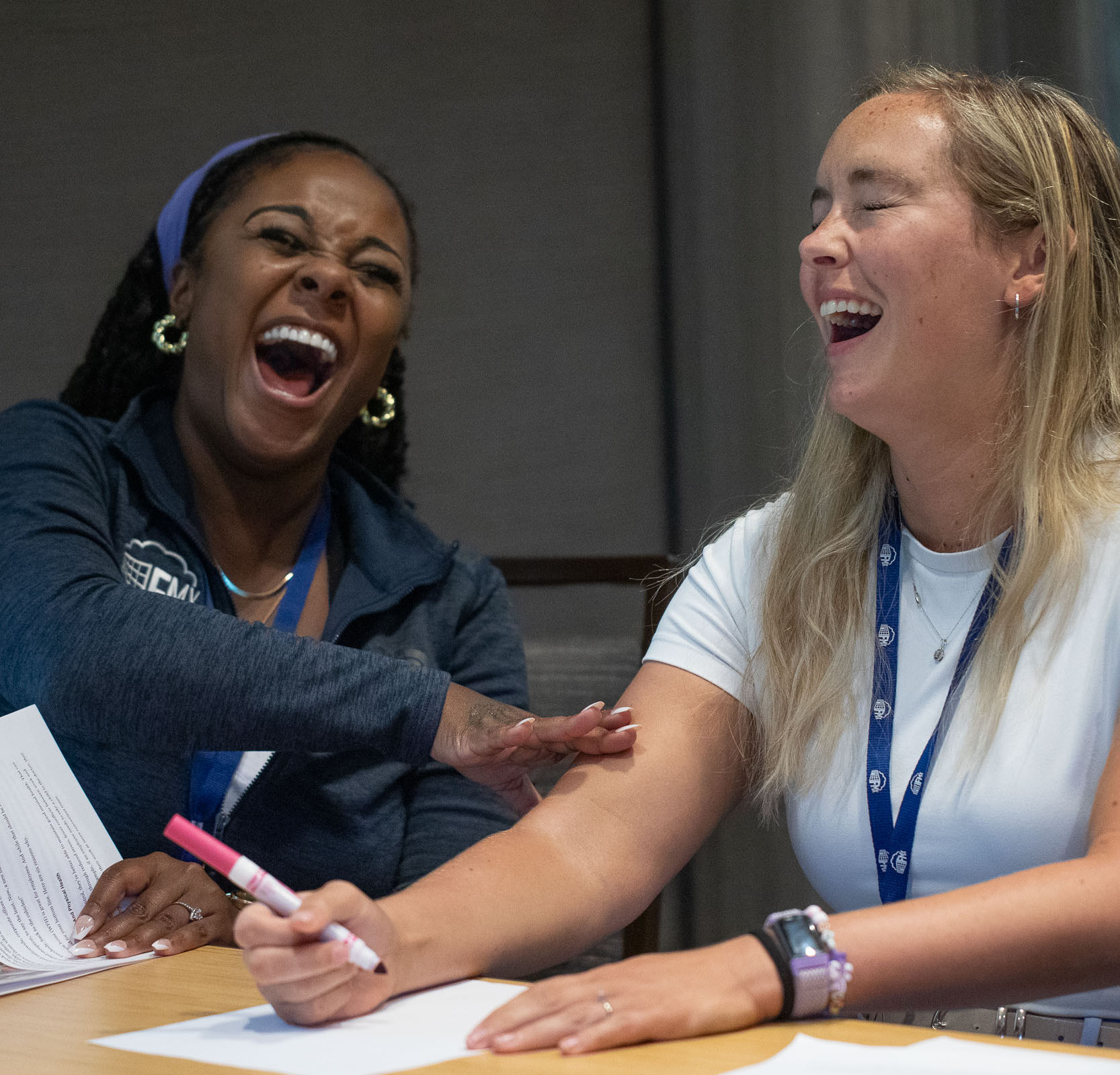 teammates having a good time meeting in-person